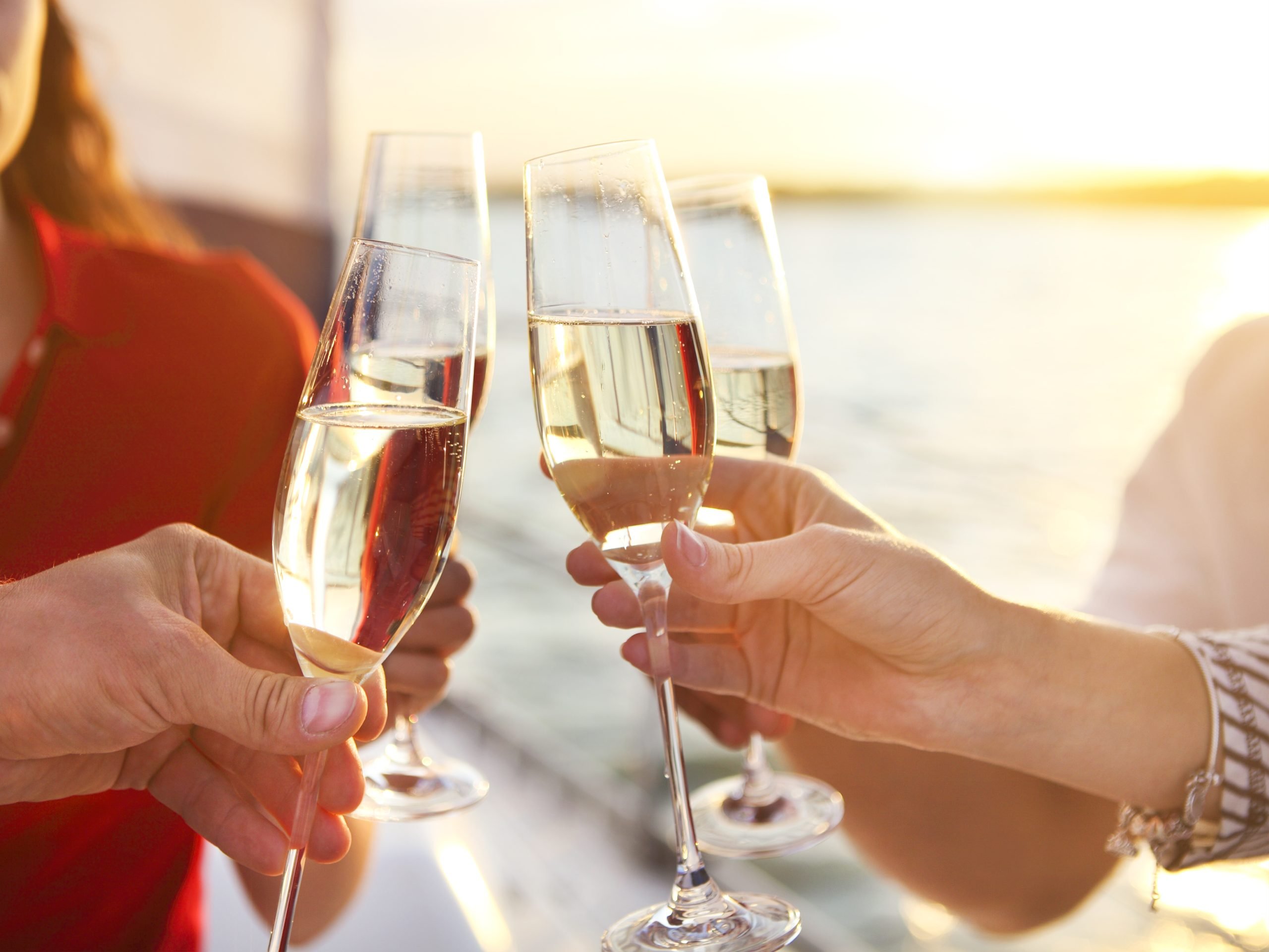 Champagne Glasses Toast at Sunset